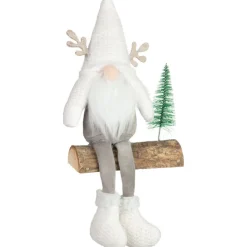 Sale Gnome assis sur le bois